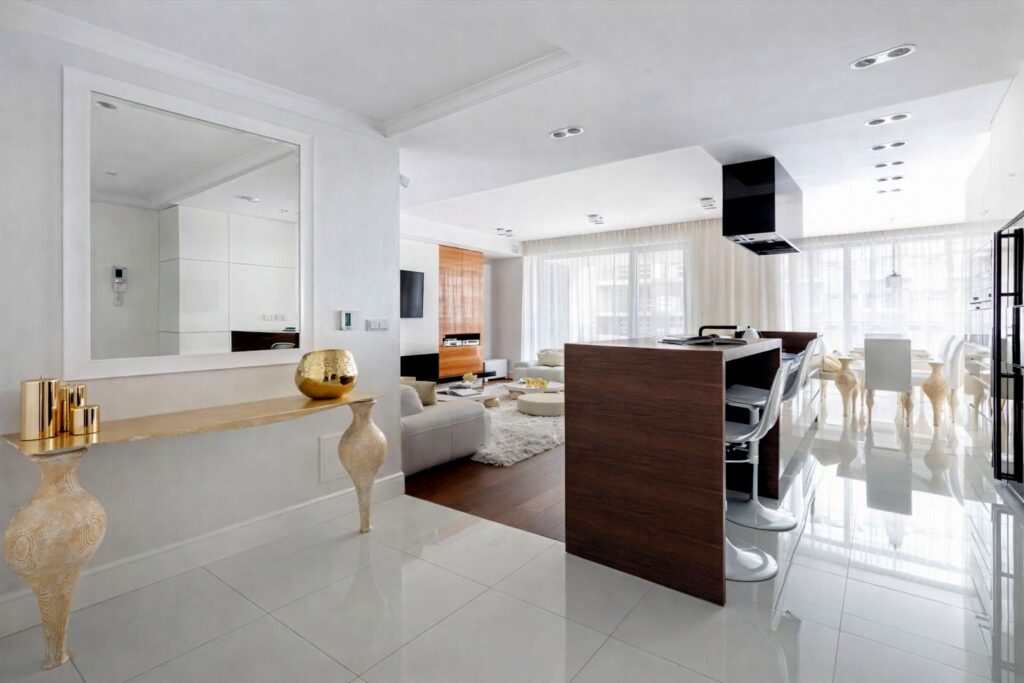 Elegant hallway and modern kitchen with island in premium apartment for rent Warsaw city centre