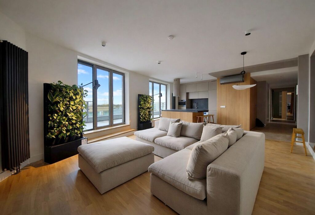 Modern dark wood terrace with minimalist metal furniture and large glass windows surrounded by a pine forest in Konstancin-Jeziorna